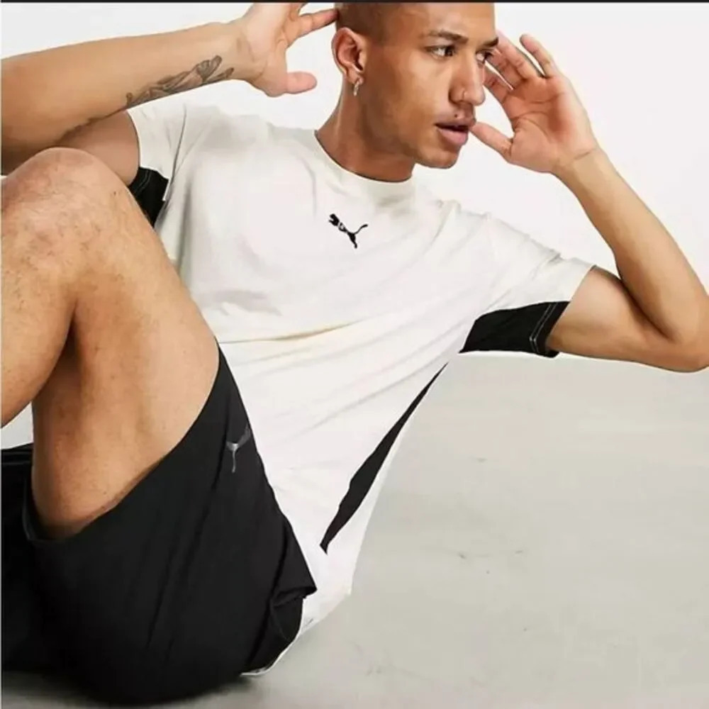PUMA Mens Train Logo Crew Neck Short Sleeve Athletic Training Athletic Tops Casu